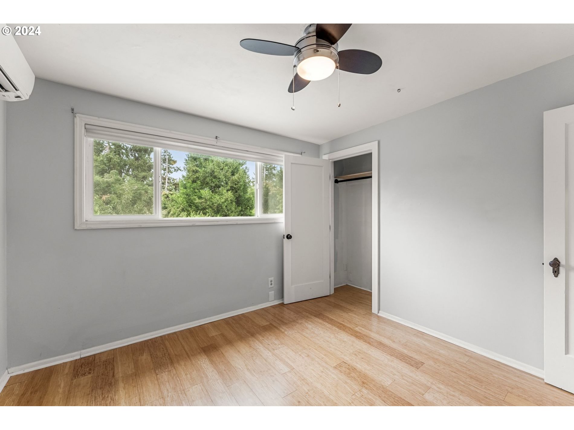 1343 West Broadway Eugene, OR 97402 - Photo 7 of 10 a view of an empty room with a window