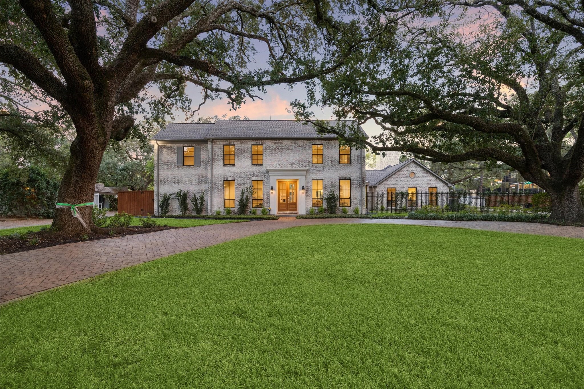 a view of house with a garden