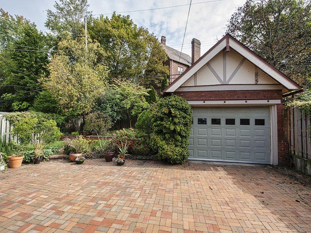 1331 Beechwood Boulevard Pittsburgh, PA 15217 - Photo 2 of 25 a front view of a house with a garden