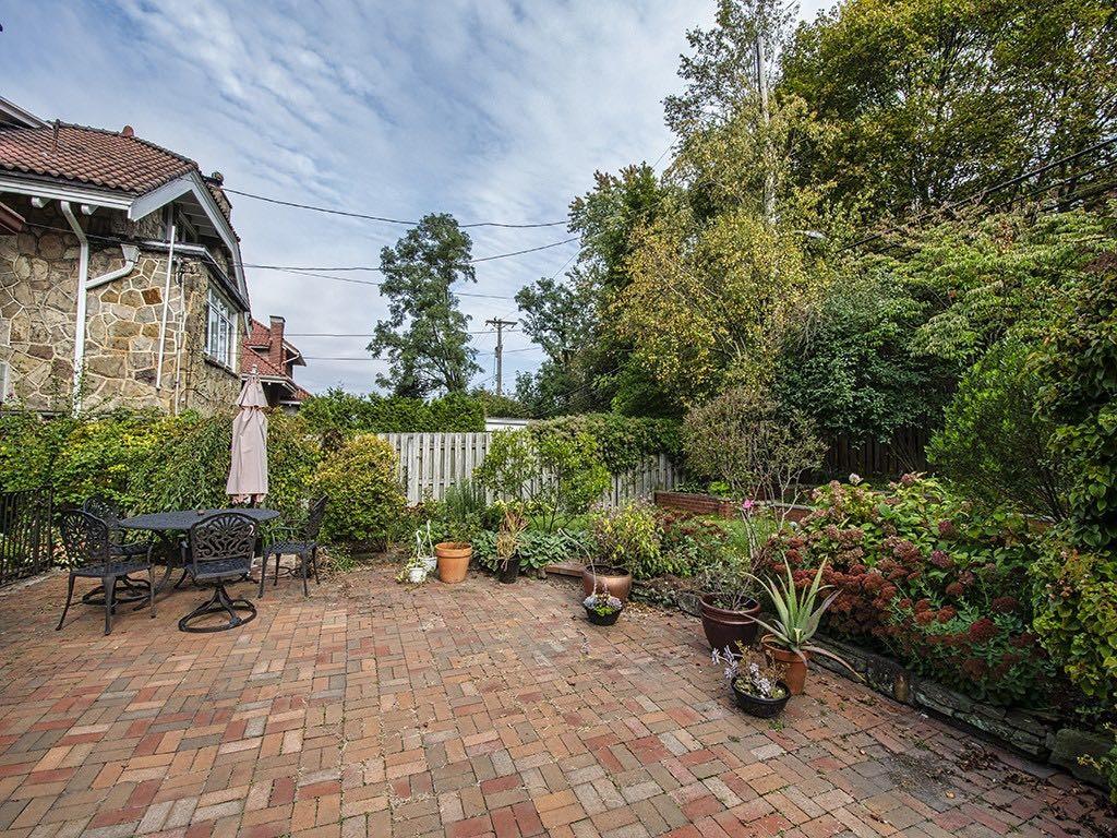 1331 Beechwood Boulevard Pittsburgh, PA 15217 - Photo 3 of 25 a view of a chair and table in the backyard