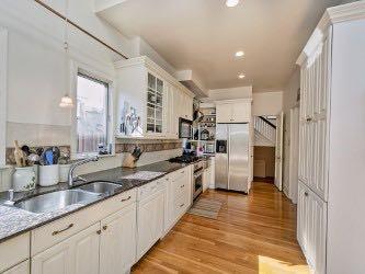 1331 Beechwood Boulevard Pittsburgh, PA 15217 - Photo 22 of 25 a view of a kitchen with a sink and refrigerator
