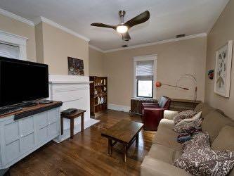 1331 Beechwood Boulevard Pittsburgh, PA 15217 - Photo 9 of 25 a living room with furniture and a flat screen tv