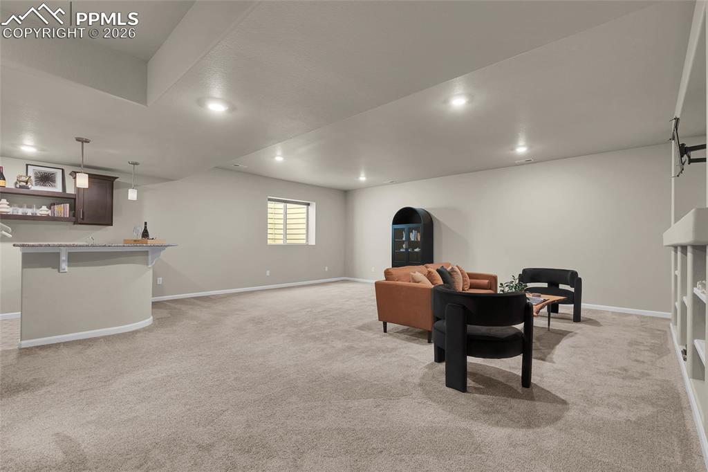11830 Alydar Loop Colorado Springs, CO 80921 - Photo 28 of 37 a view of a dining room with furniture and window