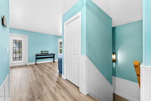 a view of kitchen and wooden floor