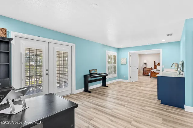 a living room with furniture and a table