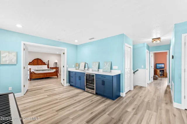 a bedroom with furniture and window