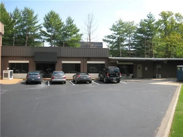 a car parked in front of a building