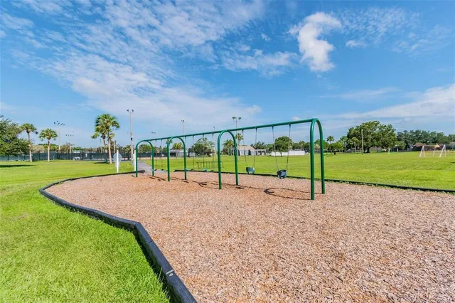 a view of a garden with basketball court