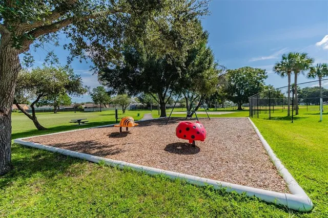 a view of a park with swings