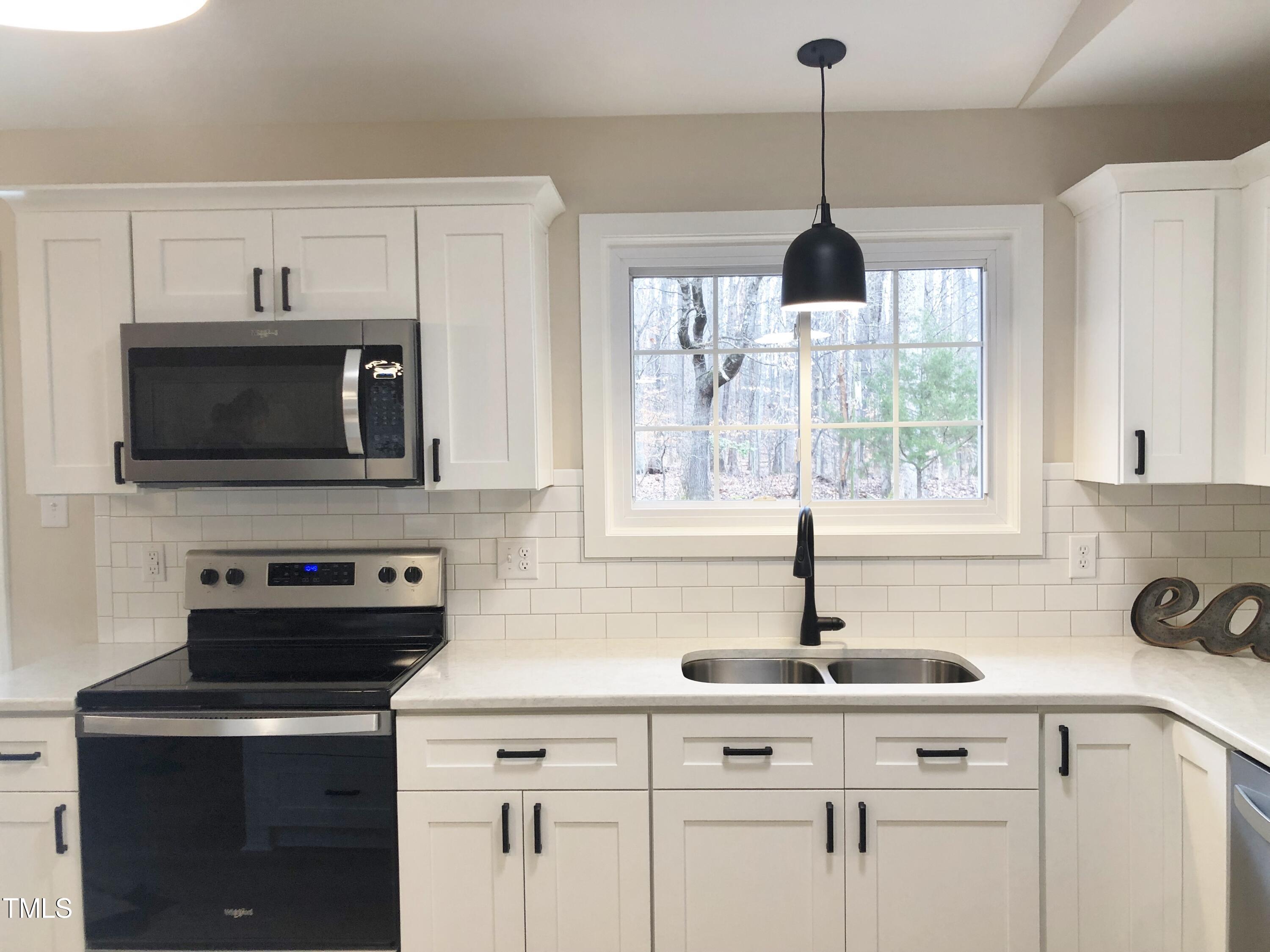 2955 Berry Pearce Road Timberlake, NC 27583 - Photo 15 of 39 Gorgeous quartz countertops