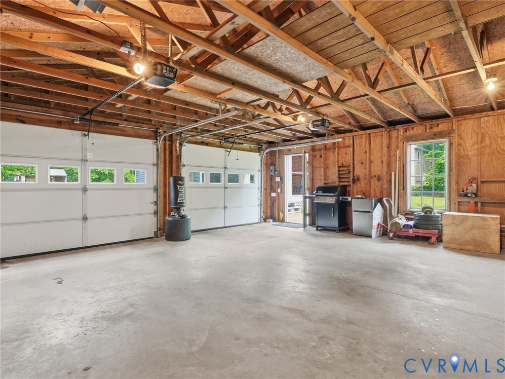 7707 Woodbrook Road Quinton, VA 23141 - Photo 37 of 42 Two-car garage featuring a concrete floor, exposed