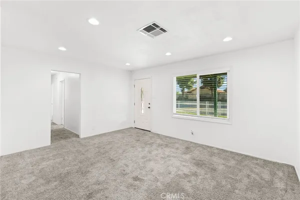an empty room with a window