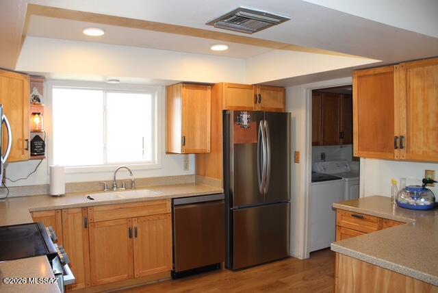 1201 East Old Stewart Road Willcox, AZ 85643 - Photo 7 of 49 a kitchen with stainless steel appliances granite countertop a refrigerator and a sink