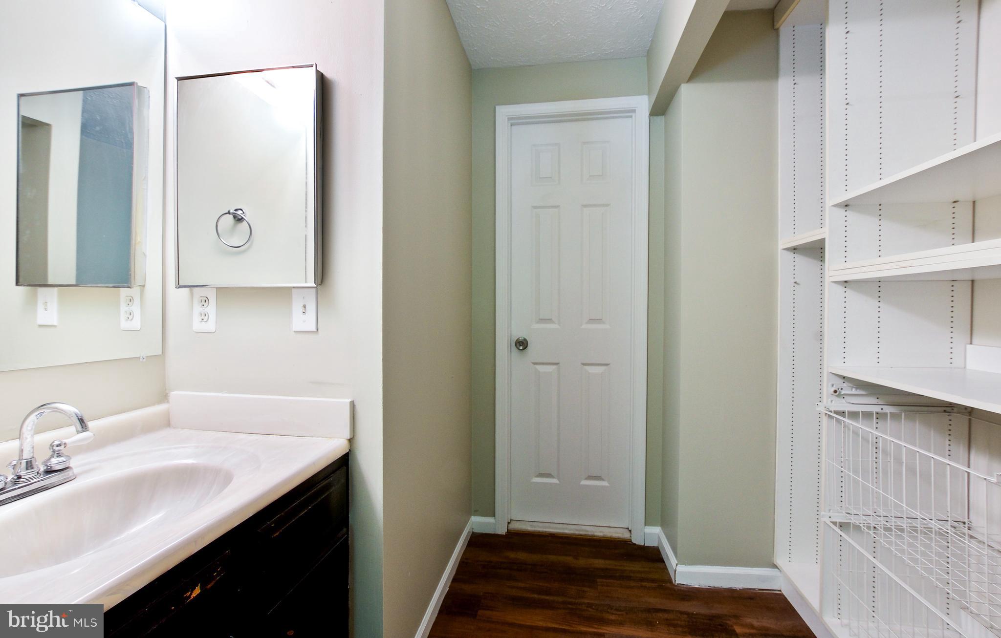 1933 Belmont Ridge Court Reston, VA 20191 - Photo 23 of 32 PRIMARY BEDROOM HAS SEPARATE SINK AND STORAGE