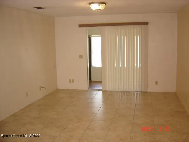 an empty room with window