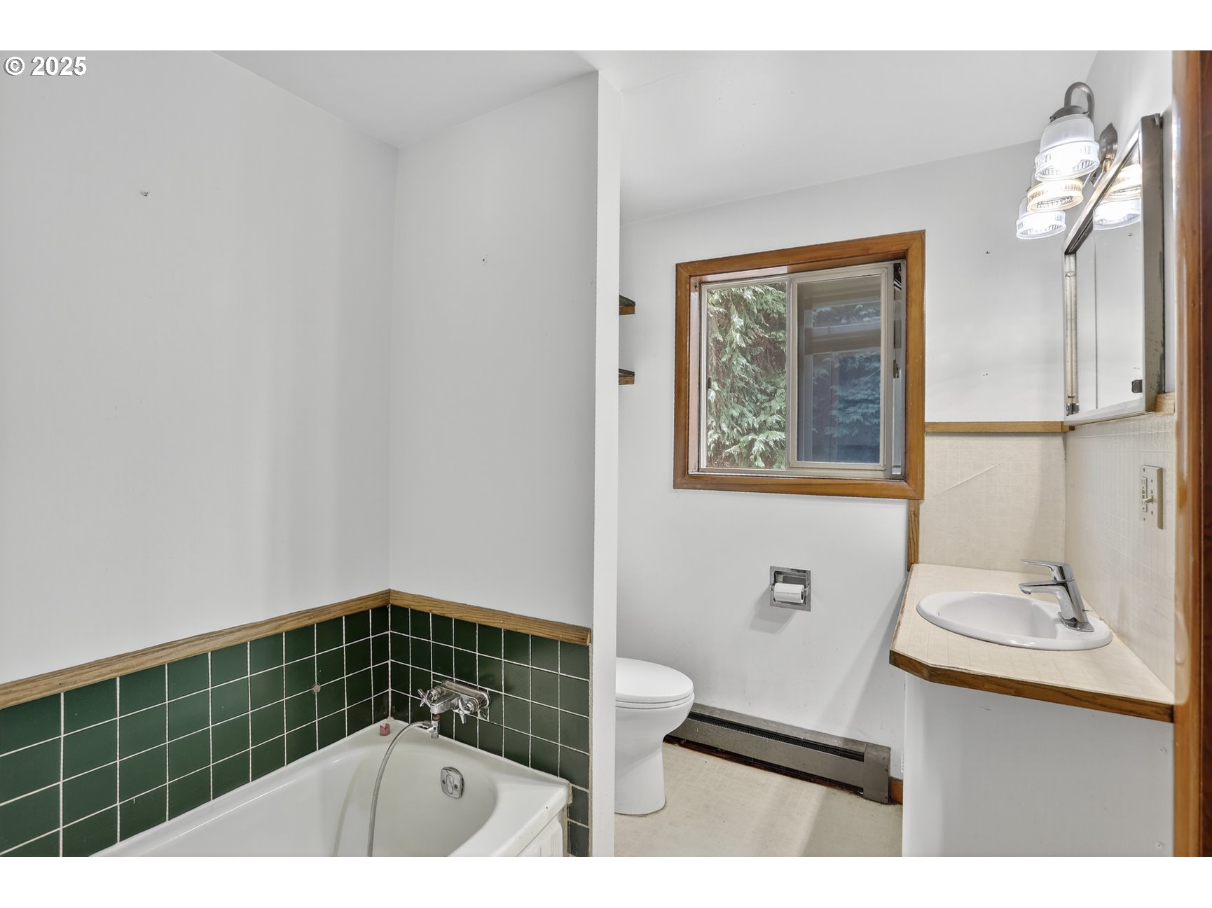 31444 New Kirk Road Scappoose, OR 97056 - Photo 18 of 43 a bathroom with a sink a mirror and a shower
