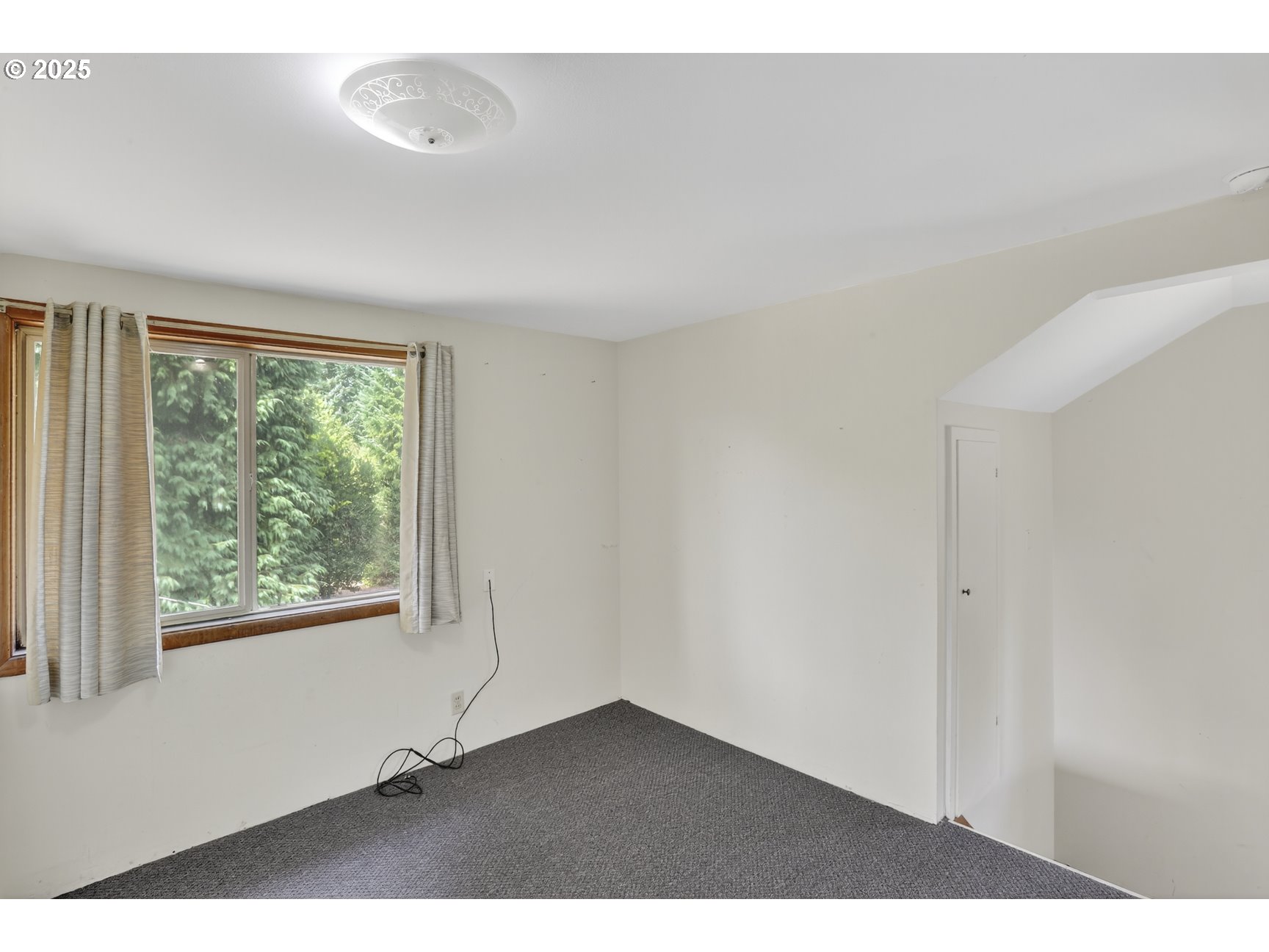 31444 New Kirk Road Scappoose, OR 97056 - Photo 20 of 43 a view of an empty room with a window