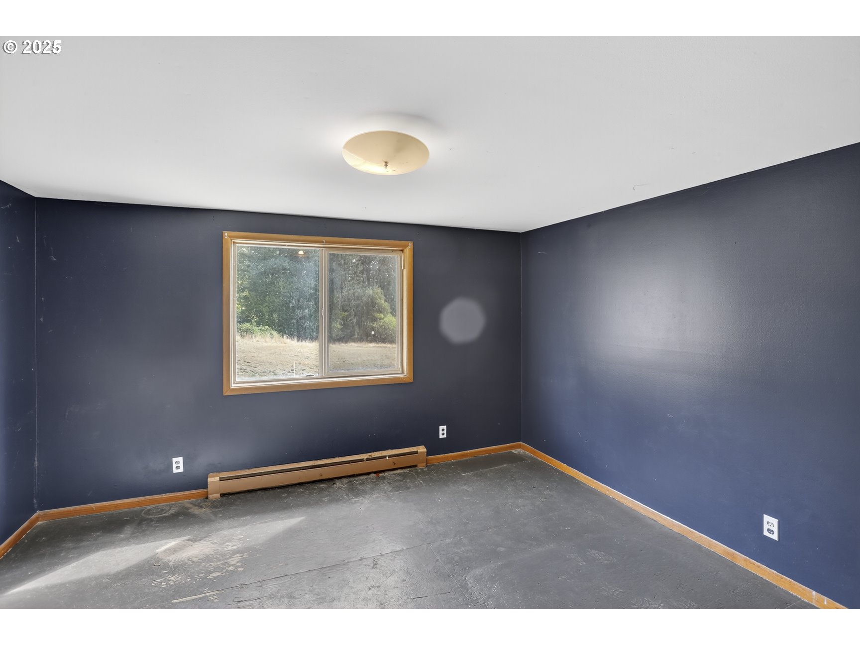 31444 New Kirk Road Scappoose, OR 97056 - Photo 23 of 43 an empty room with a window