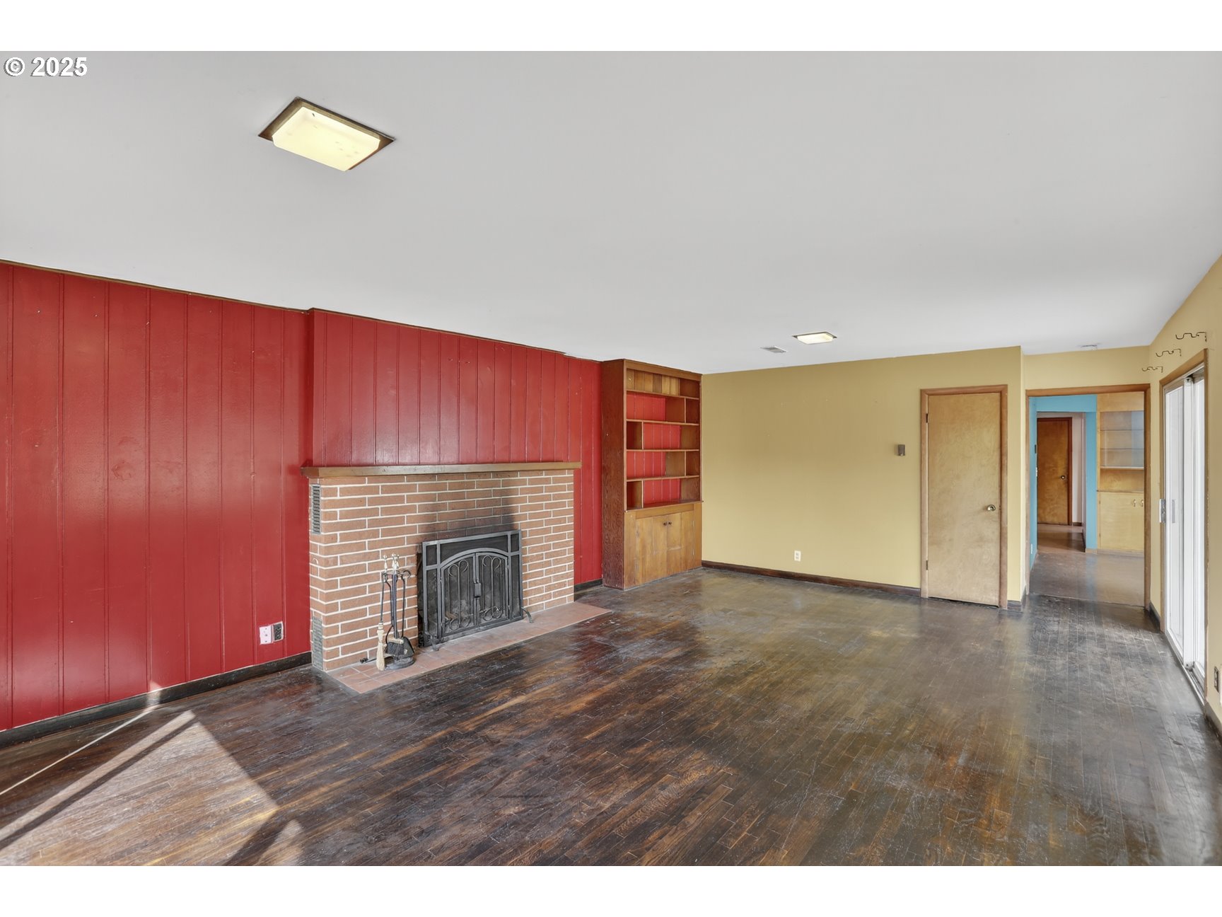 31444 New Kirk Road Scappoose, OR 97056 - Photo 6 of 43 a view of an empty room with a fireplace and a window