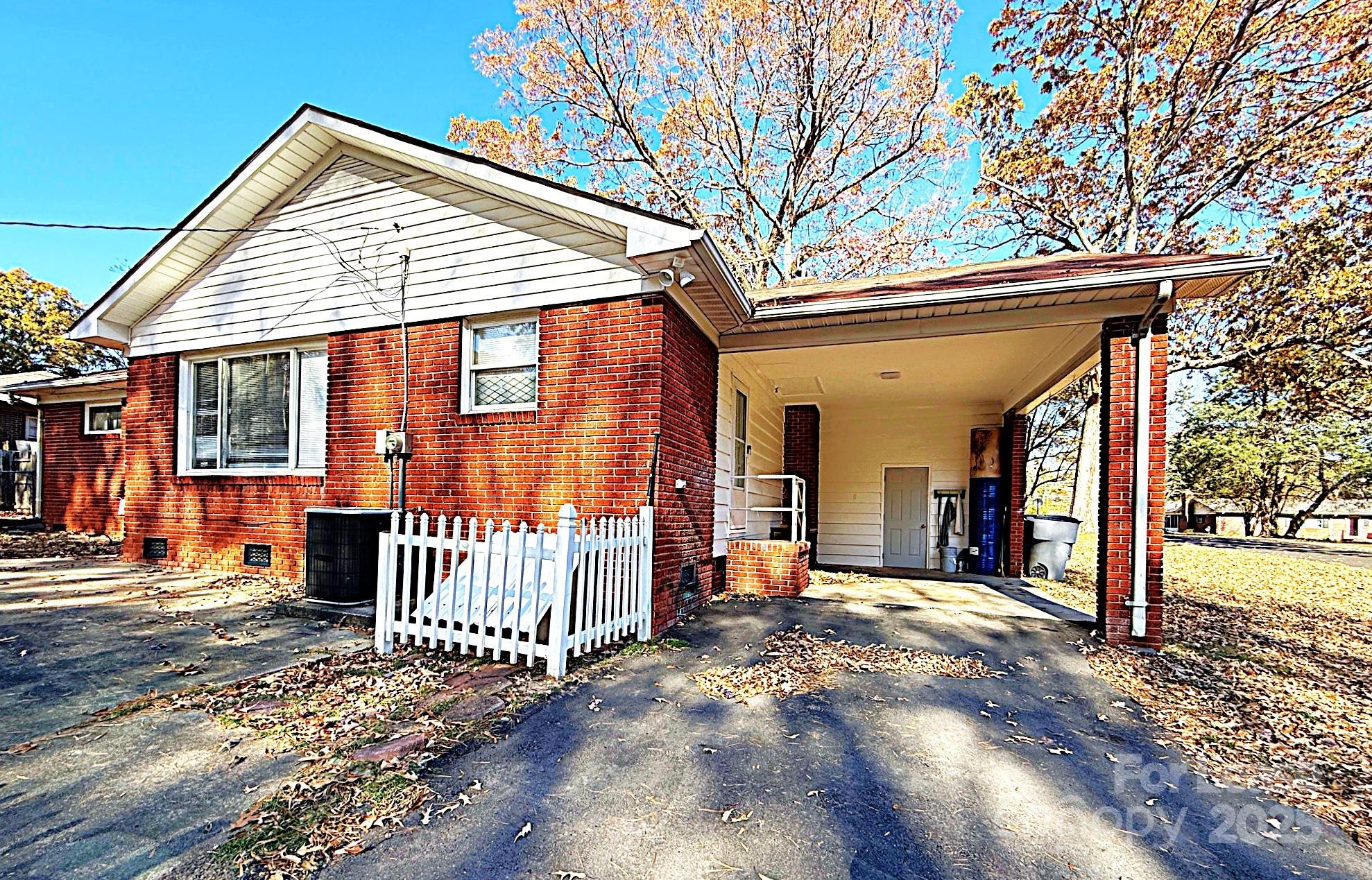 664 Denning Place Charlotte, NC 28227 - Photo 6 of 6 a view of a house with a outdoor space