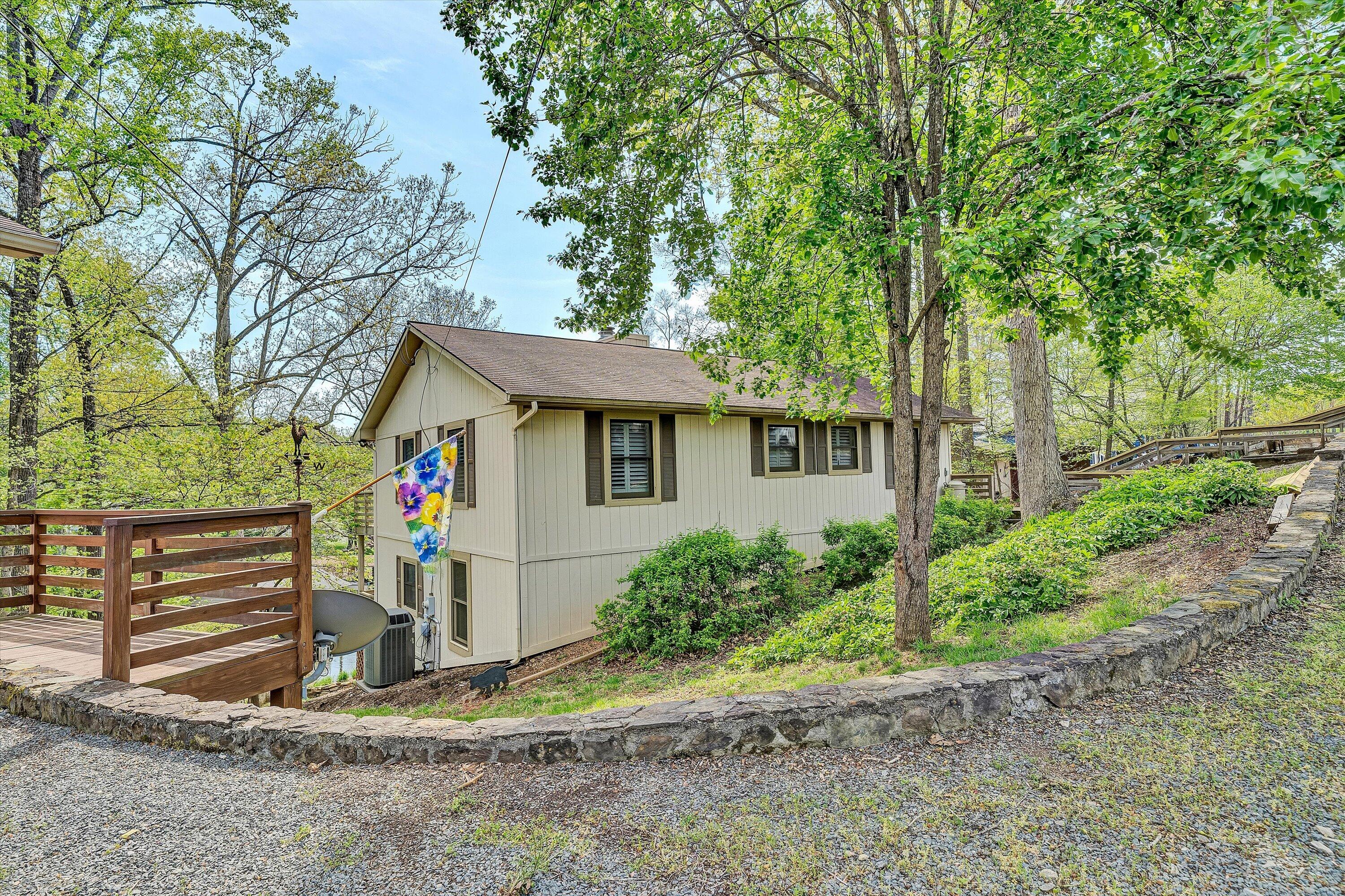 259 Brooks Point Lane Union Hall, VA 24176 - Photo 3 of 59 a front view of a house with garden