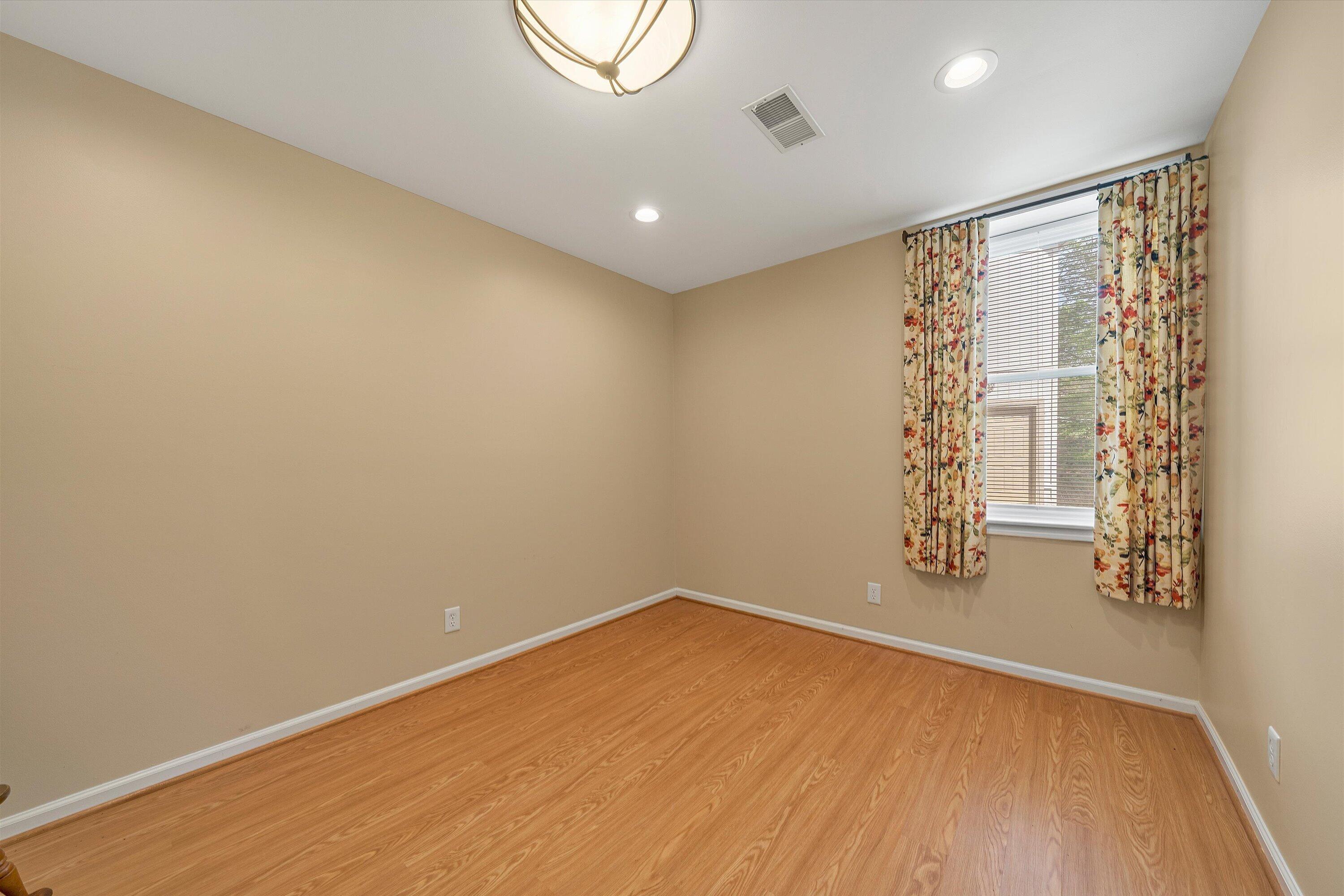 259 Brooks Point Lane Union Hall, VA 24176 - Photo 32 of 59 a view of a room with wooden floor and white walls
