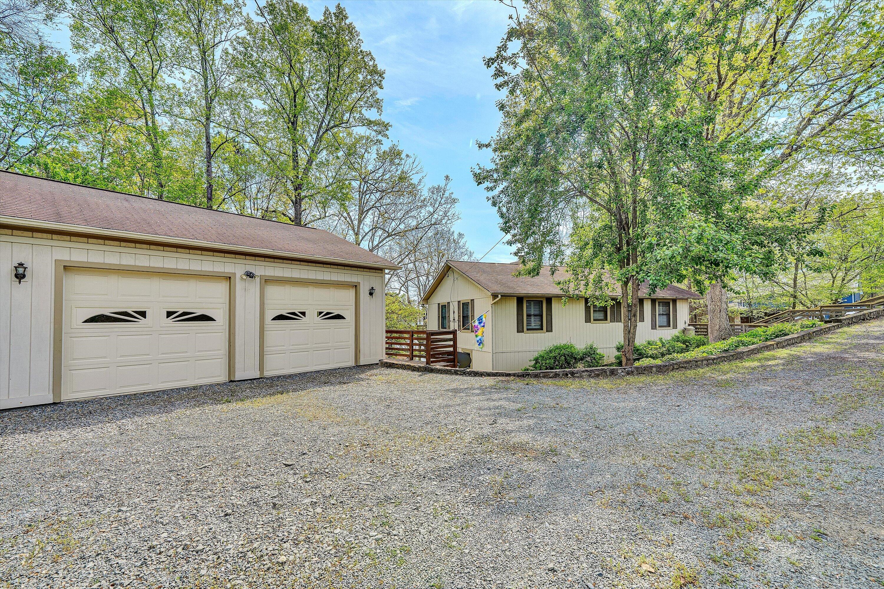259 Brooks Point Lane Union Hall, VA 24176 - Photo 50 of 59 a view of a house with a yard and garage
