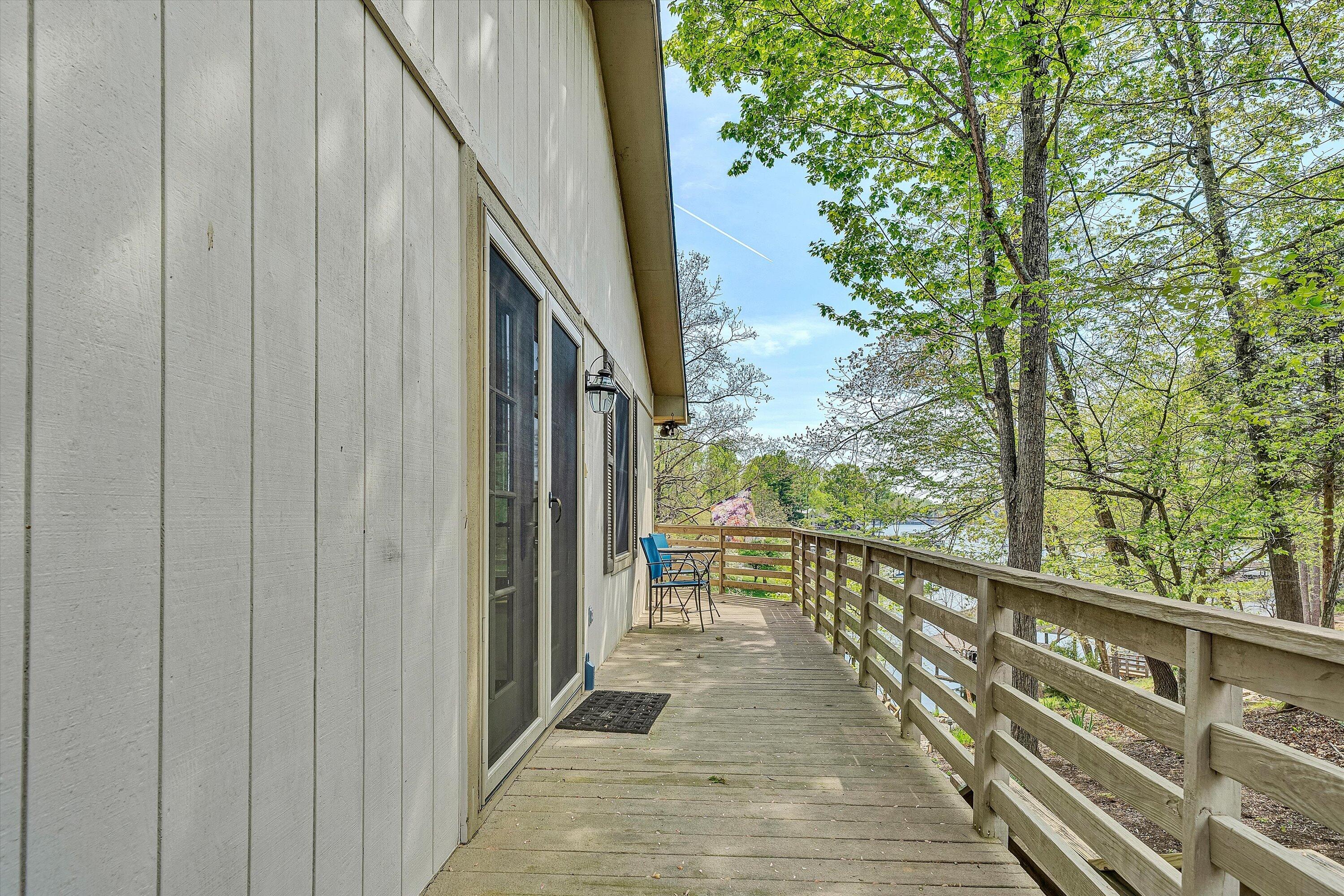 259 Brooks Point Lane Union Hall, VA 24176 - Photo 5 of 59 a view of balcony with wooden floor and fence