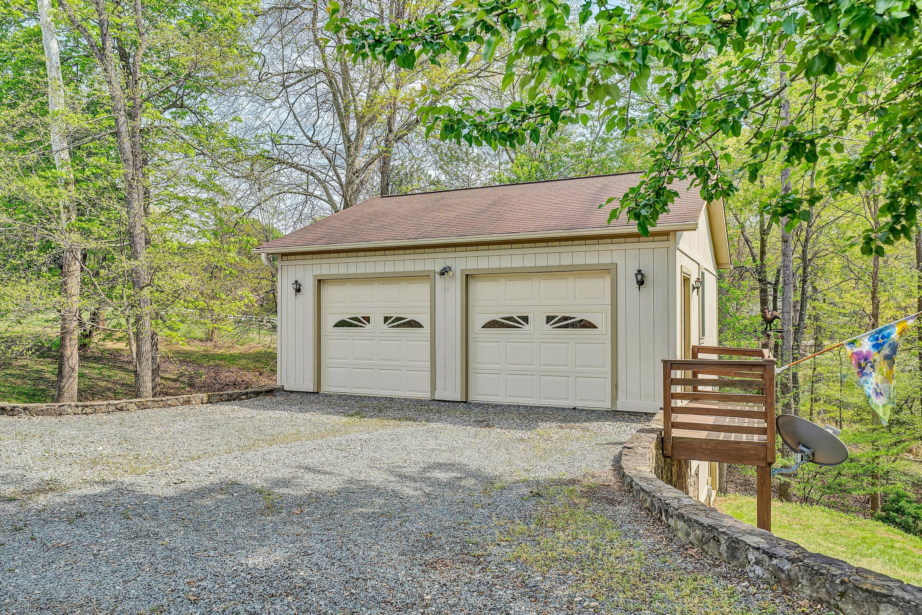 259 Brooks Point Lane Union Hall, VA 24176 - Photo 51 of 59 a view of a house with a yard and garage