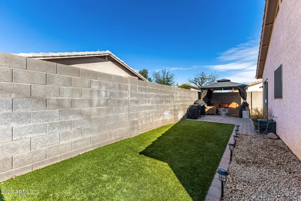 a view of a back yard of the house