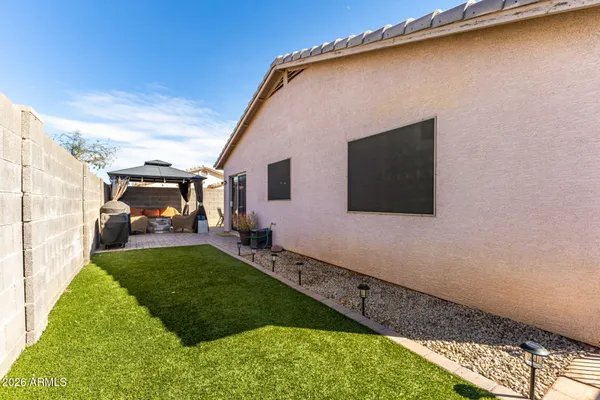 a house view with a garden space
