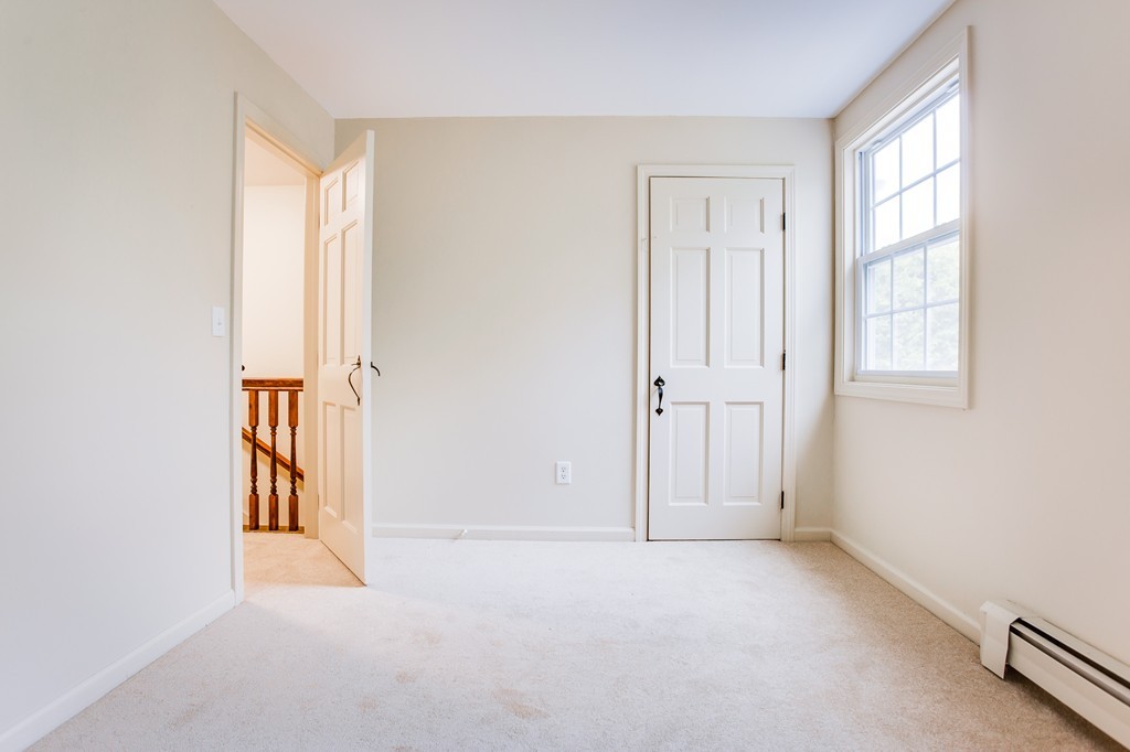 233 Middle Road Newbury, MA 01922 - Photo 17 of 30 an empty room with windows