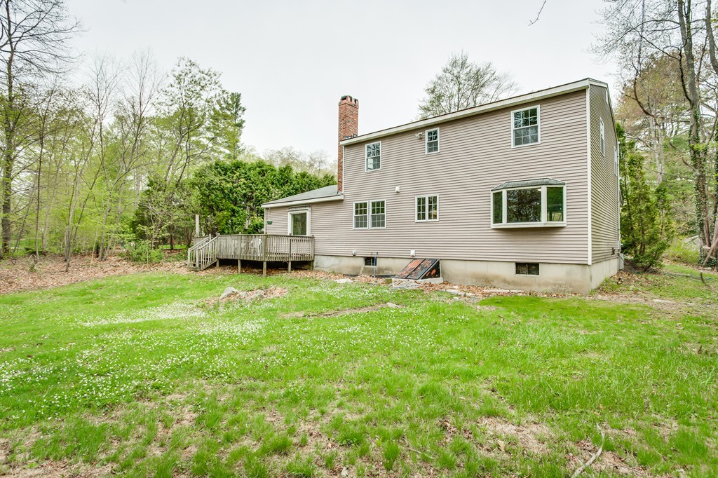 233 Middle Road Newbury, MA 01922 - Photo 29 of 30 a front view of house with yard and trees