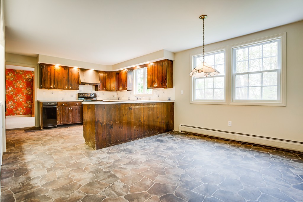 233 Middle Road Newbury, MA 01922 - Photo 7 of 30 a view of a kitchen with a stove