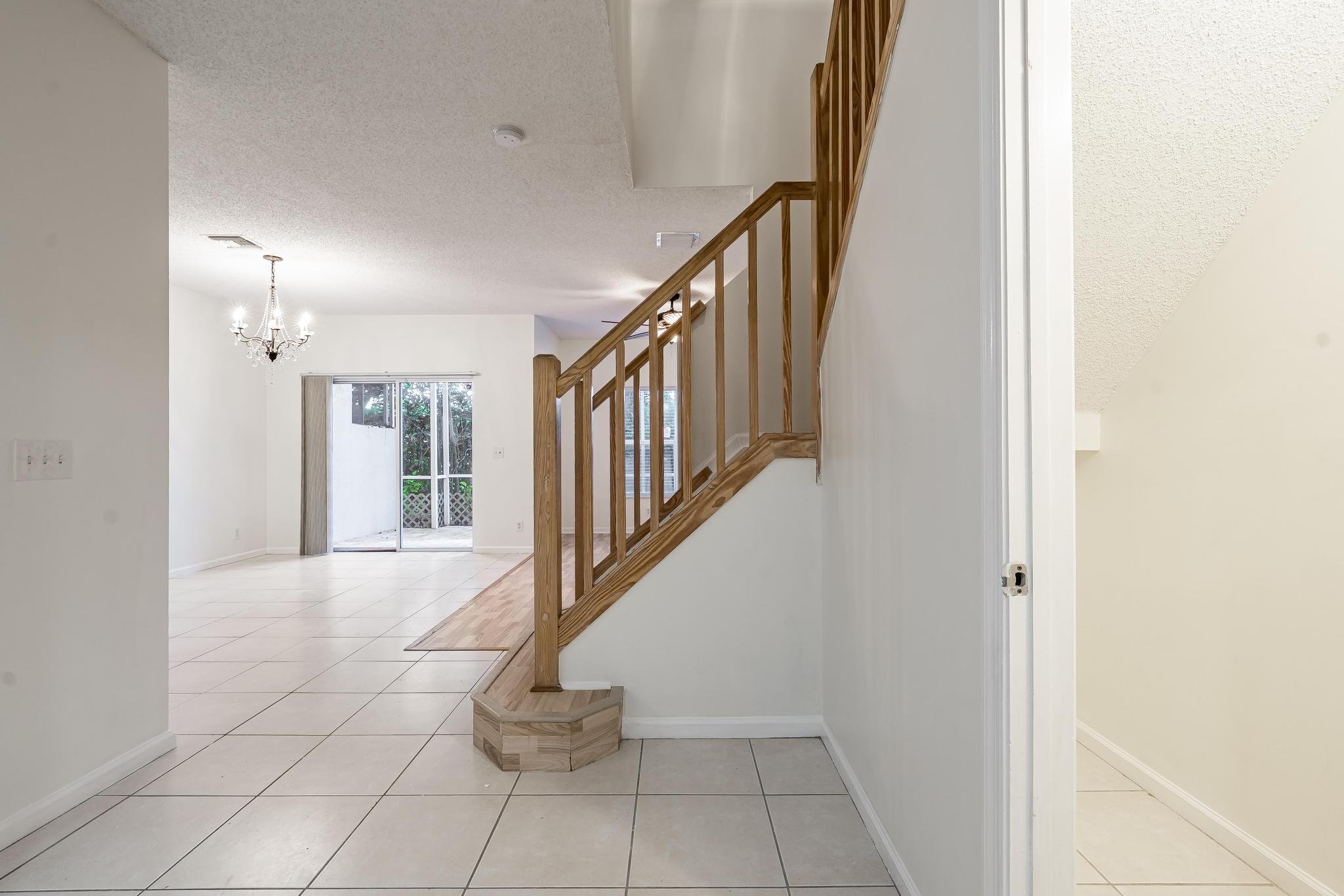 8271 Vía Serena Boca Raton, FL 33433 - Photo 6 of 33 a view of an entryway with wooden floor