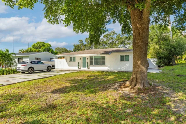 a house view with a garden space