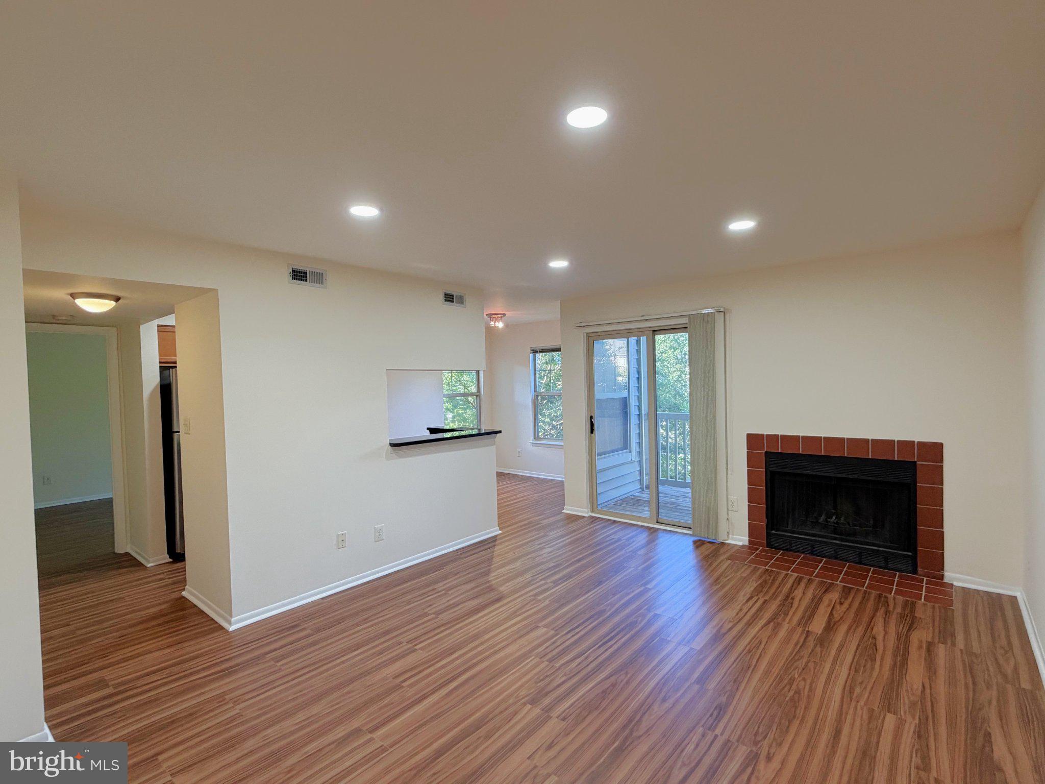 11653 Gas Light Court, Unit H Reston, VA 20190 - Photo 3 of 28 Bright and inviting living space.