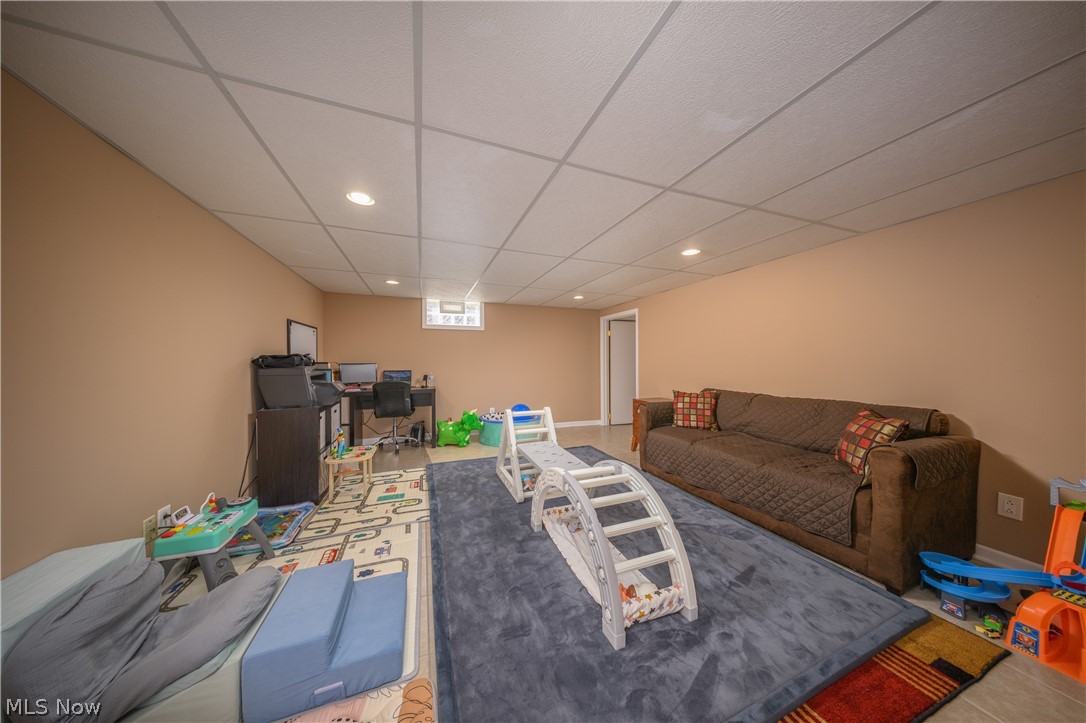 4431 7th Street Northwest Canton, OH 44708 - Photo 16 of 23 Living area featuring recessed lighting and a drop ceiling