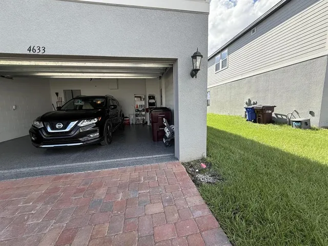 a view of a car park in front of a building