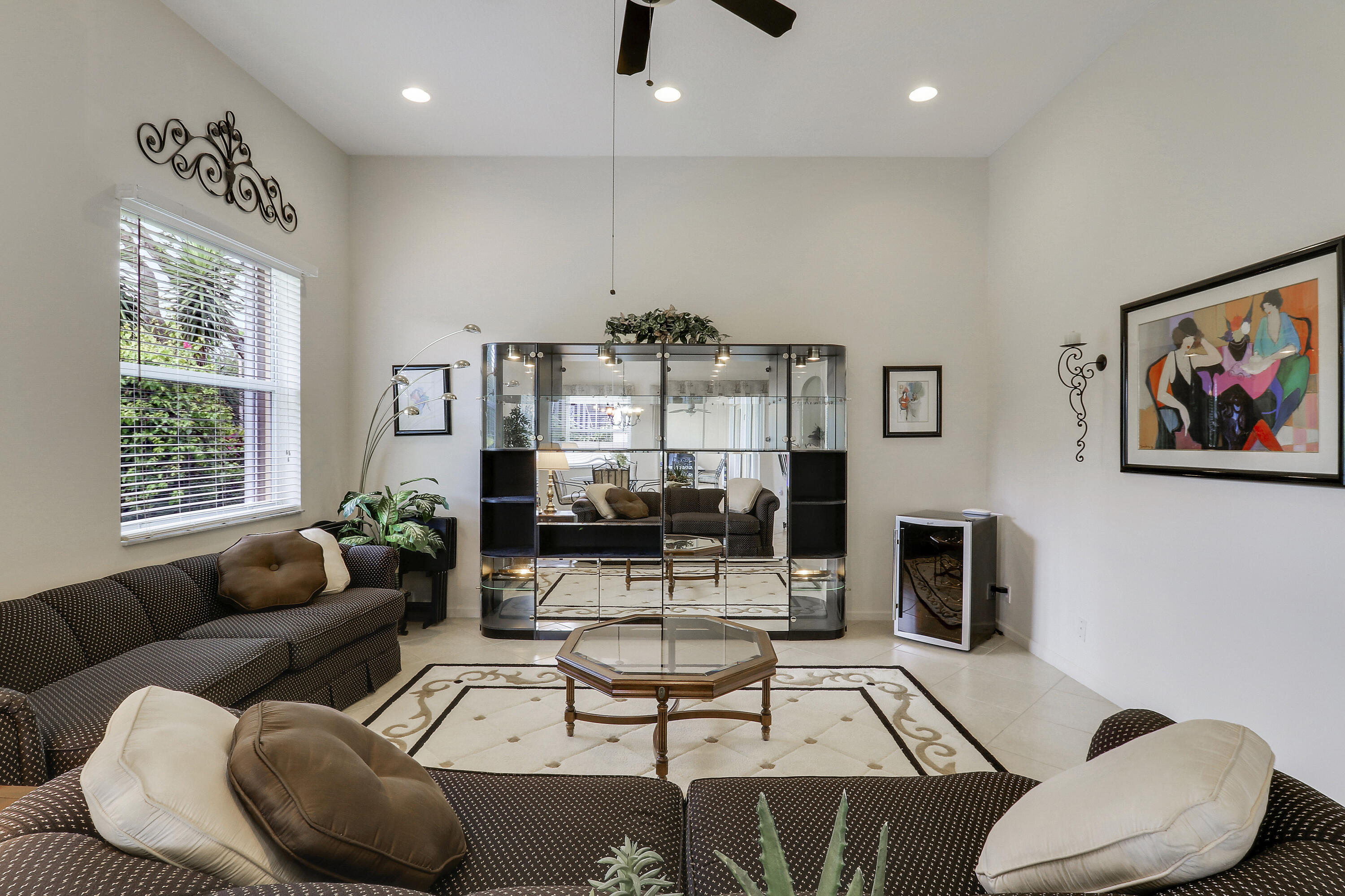 6565 Garde Road Boynton Beach, FL 33472 - Photo 15 of 54 a living room with furniture and a large window