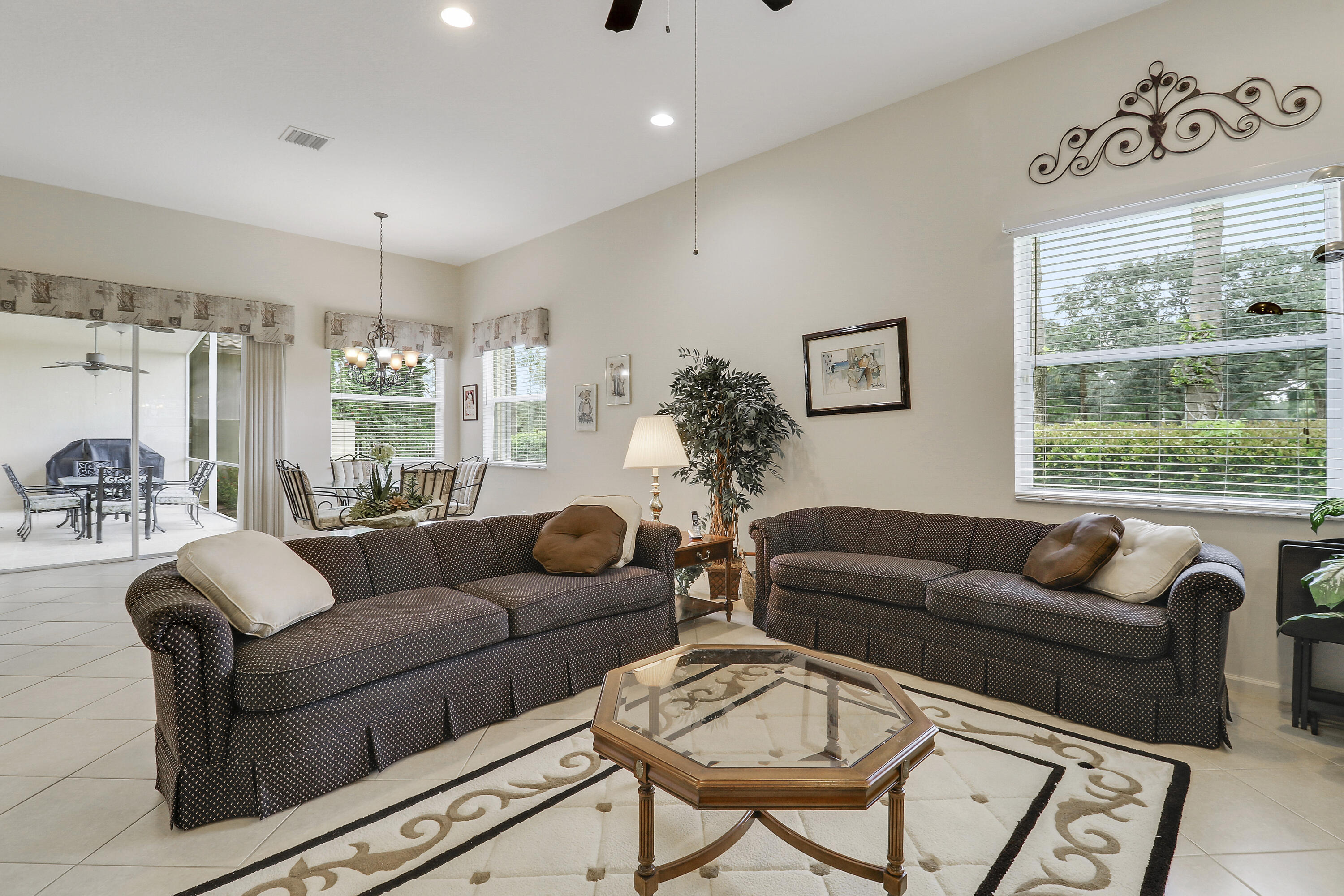 6565 Garde Road Boynton Beach, FL 33472 - Photo 17 of 54 a living room with furniture and a large window