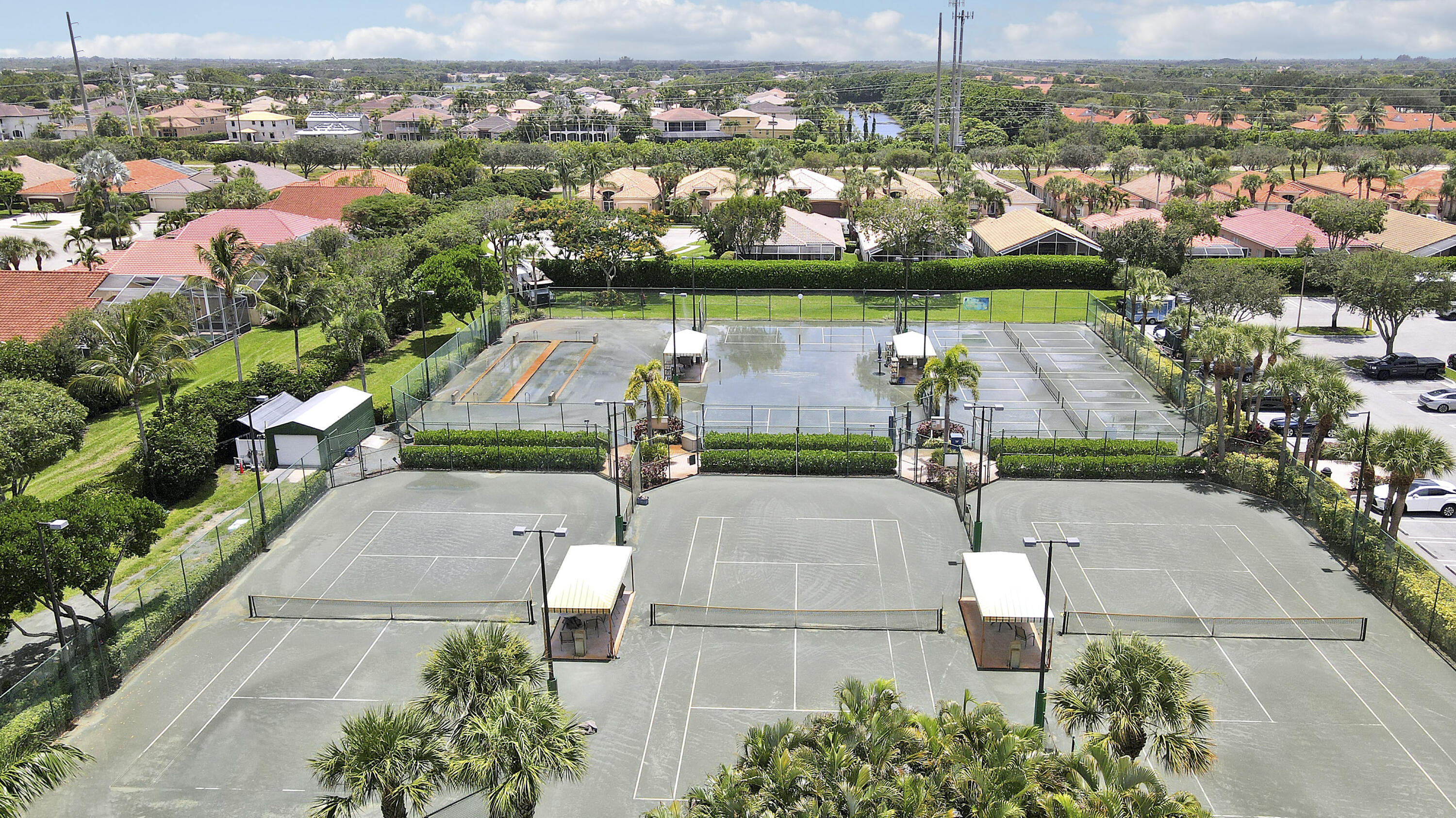 6565 Garde Road Boynton Beach, FL 33472 - Photo 42 of 54 an aerial view of a house with a garden