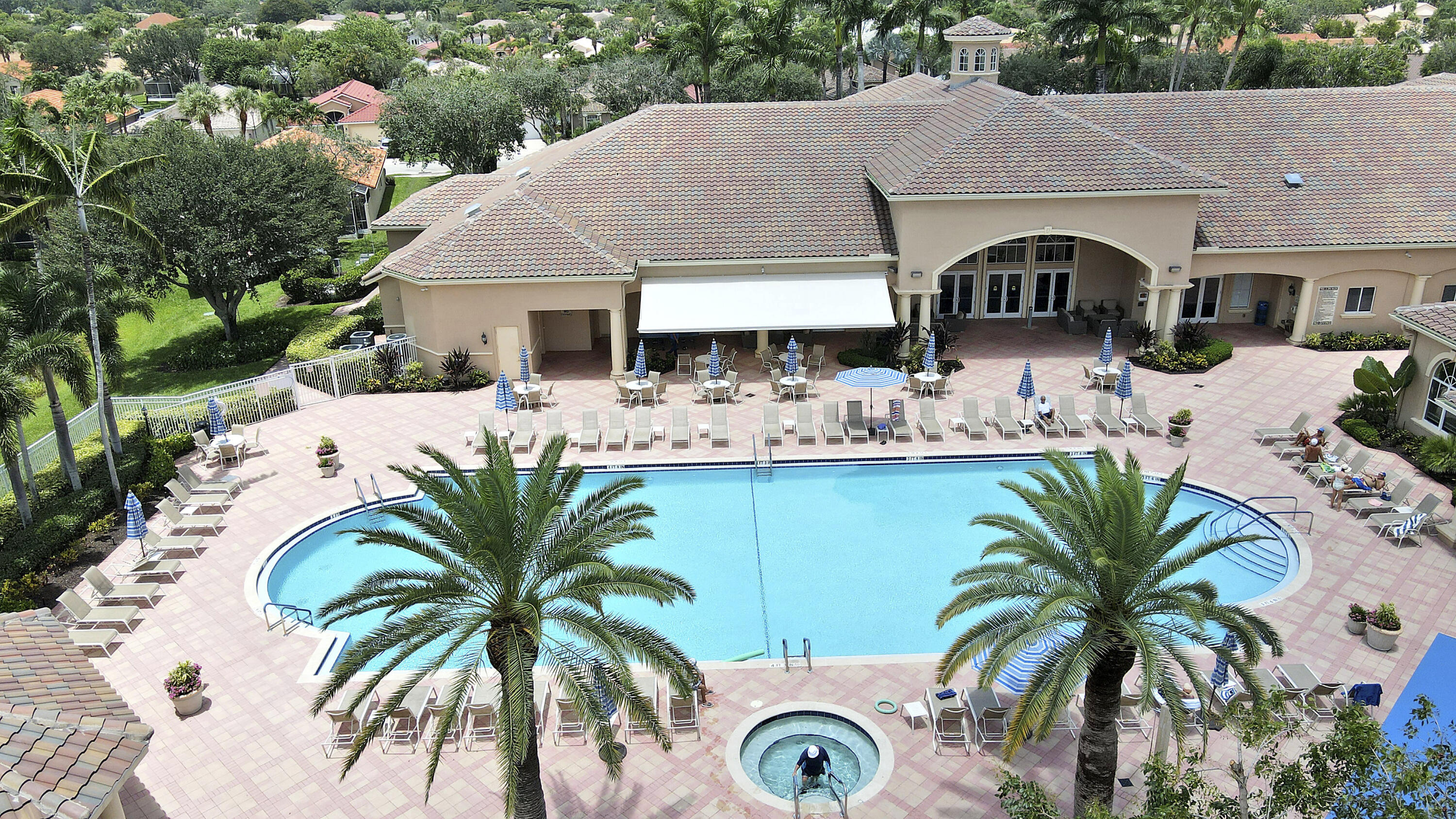 6565 Garde Road Boynton Beach, FL 33472 - Photo 45 of 54 a view of house with swimming pool outdoor seating