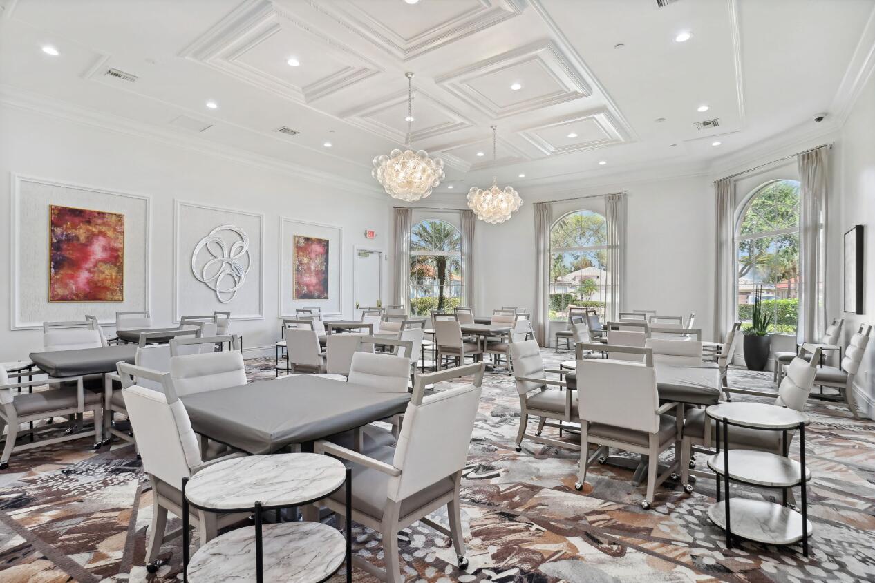 6565 Garde Road Boynton Beach, FL 33472 - Photo 51 of 54 a view of a dining room with furniture window and outside view