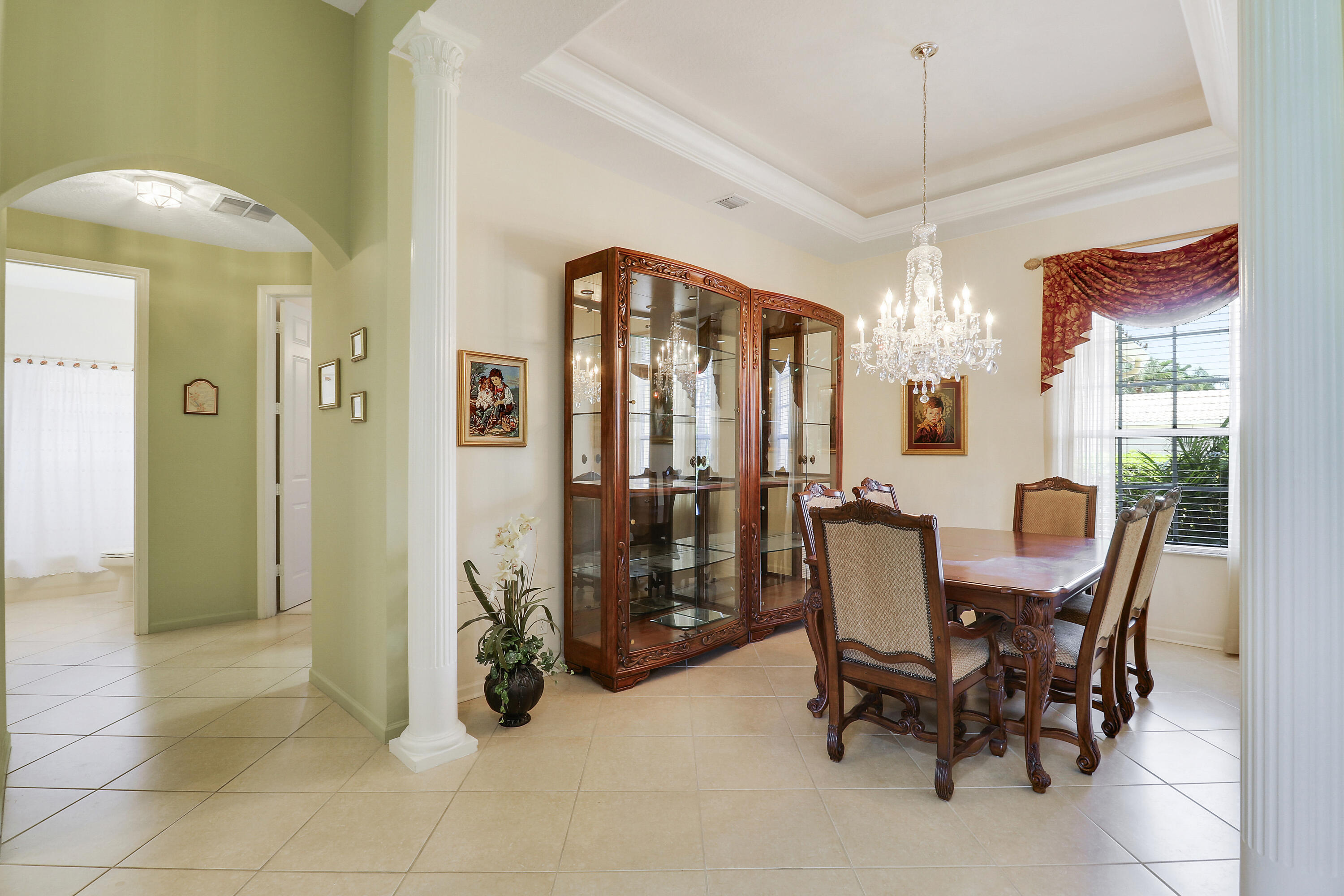 6565 Garde Road Boynton Beach, FL 33472 - Photo 6 of 54 a view of a dining room with furniture window and outside view