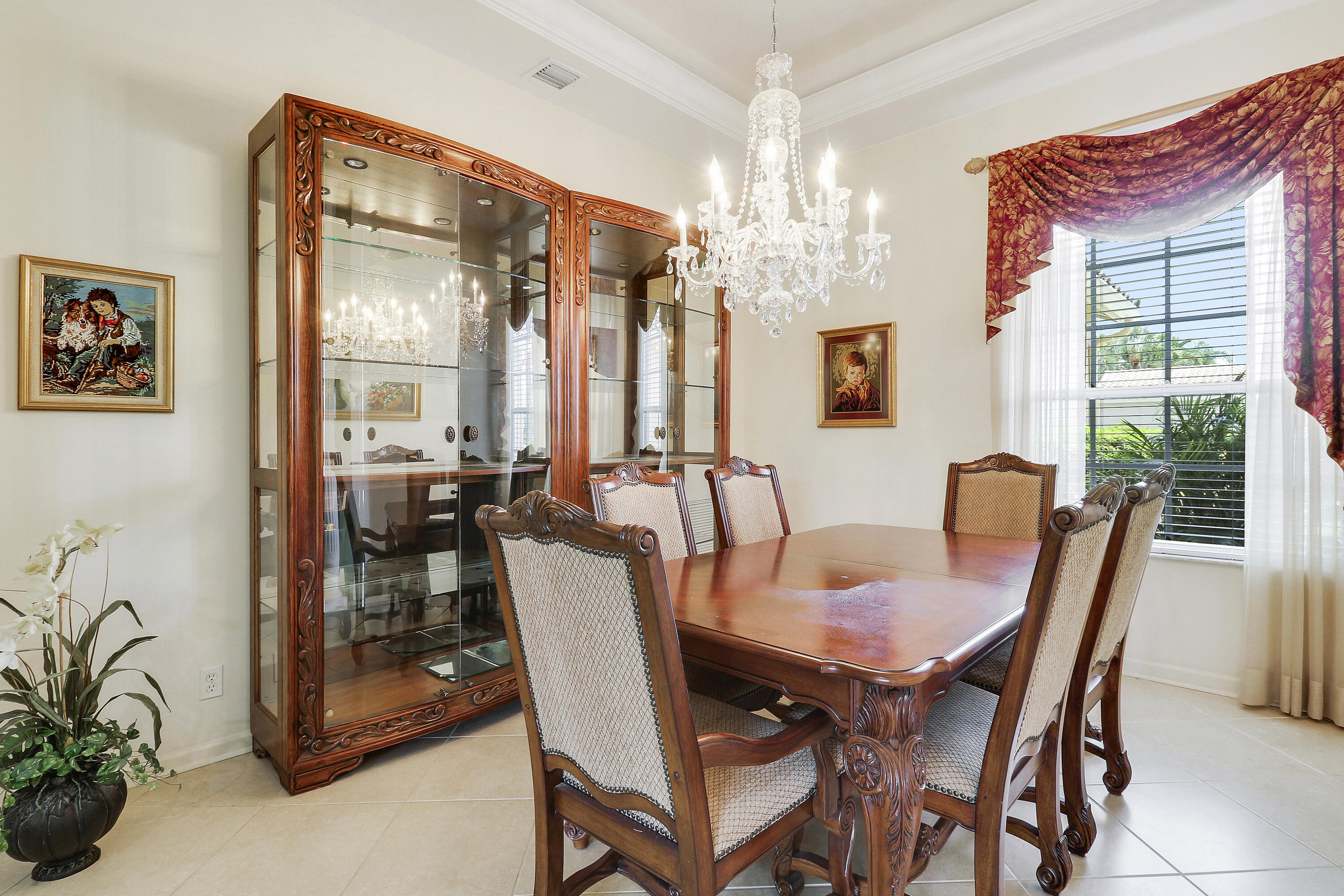 6565 Garde Road Boynton Beach, FL 33472 - Photo 7 of 54 a view of a dining room with furniture window and outside view