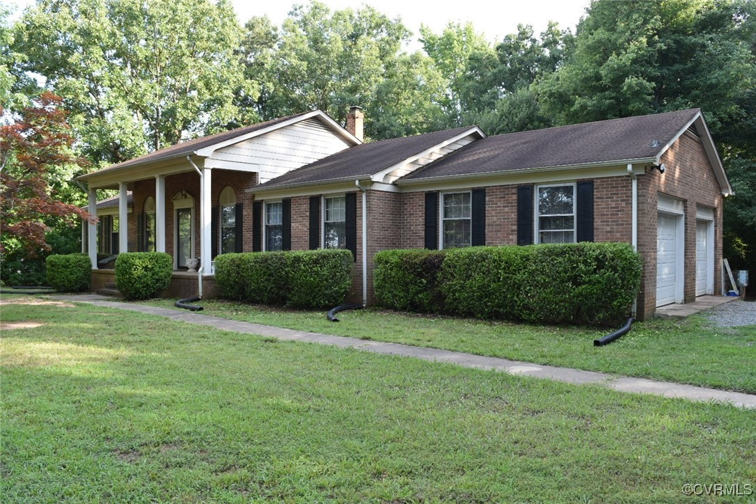 3023 Mt Laurel Road Clover, VA 24534 - Photo 1 of 26 a view of a house with a yard
