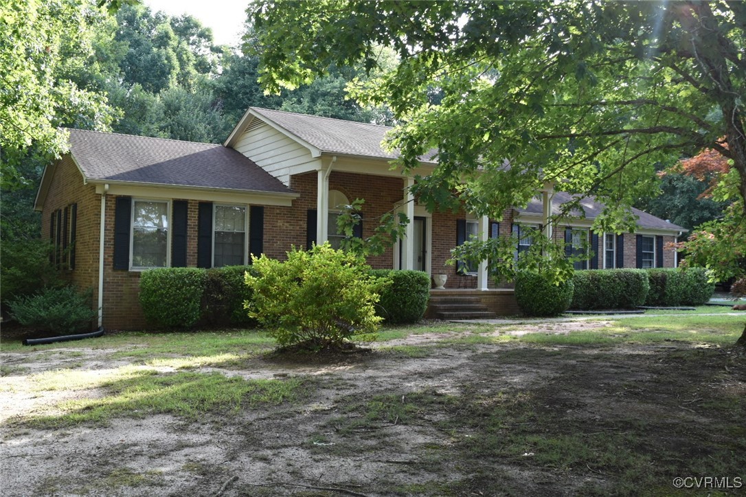 3023 Mt Laurel Road Clover, VA 24534 - Photo 3 of 26 a view of a house with yard and plants