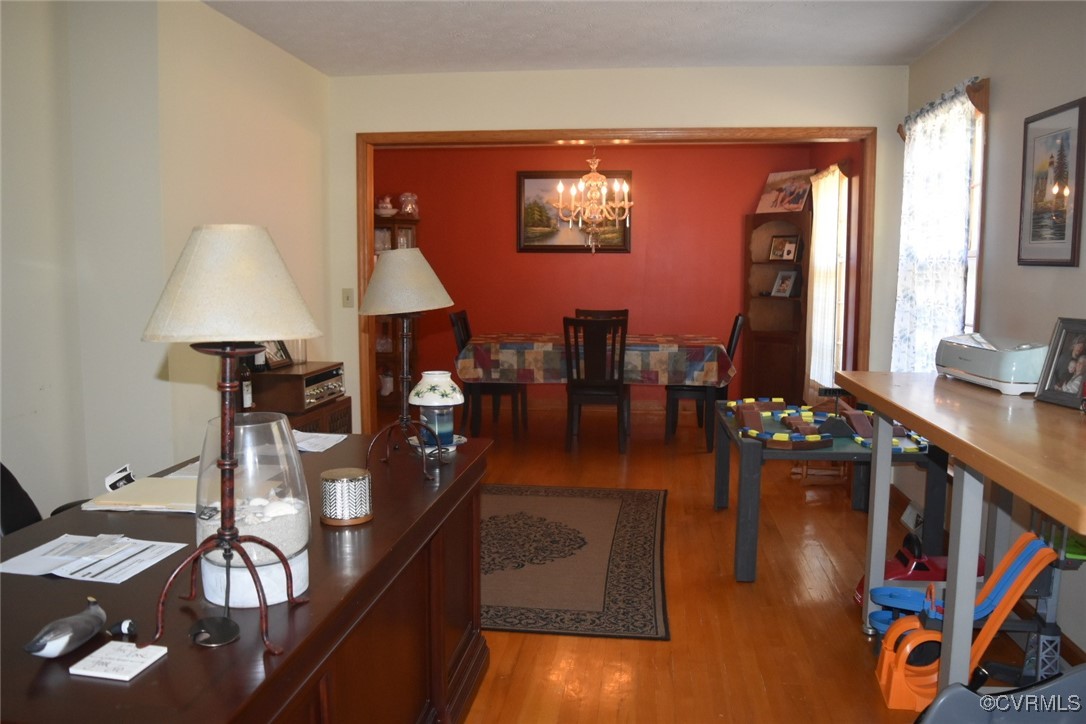 3023 Mt Laurel Road Clover, VA 24534 - Photo 10 of 26 a living room with furniture and wooden floor