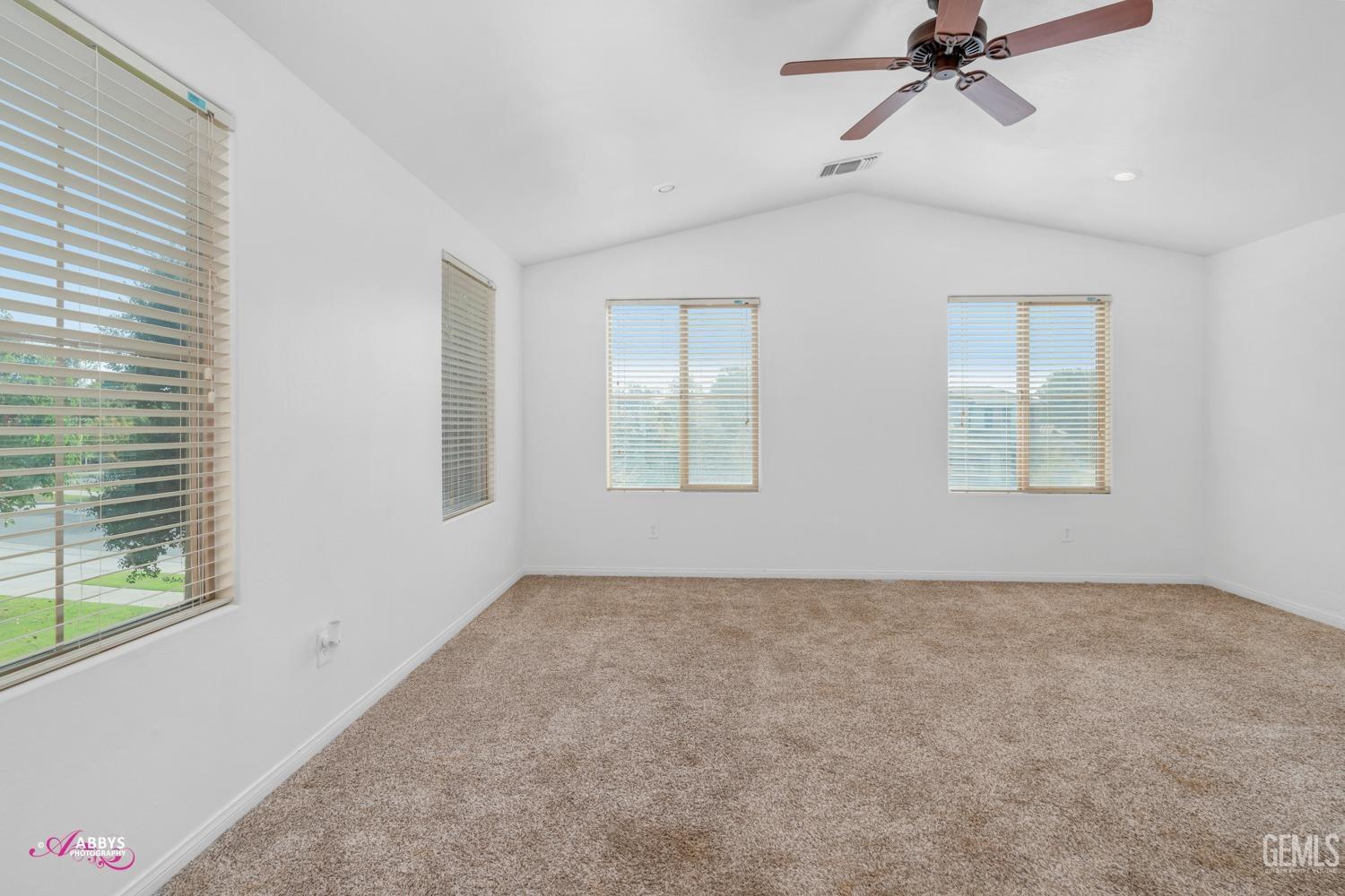 Undisclosed Address Bakersfield, CA 93312 - Photo 15 of 44 a view of an empty room with a window